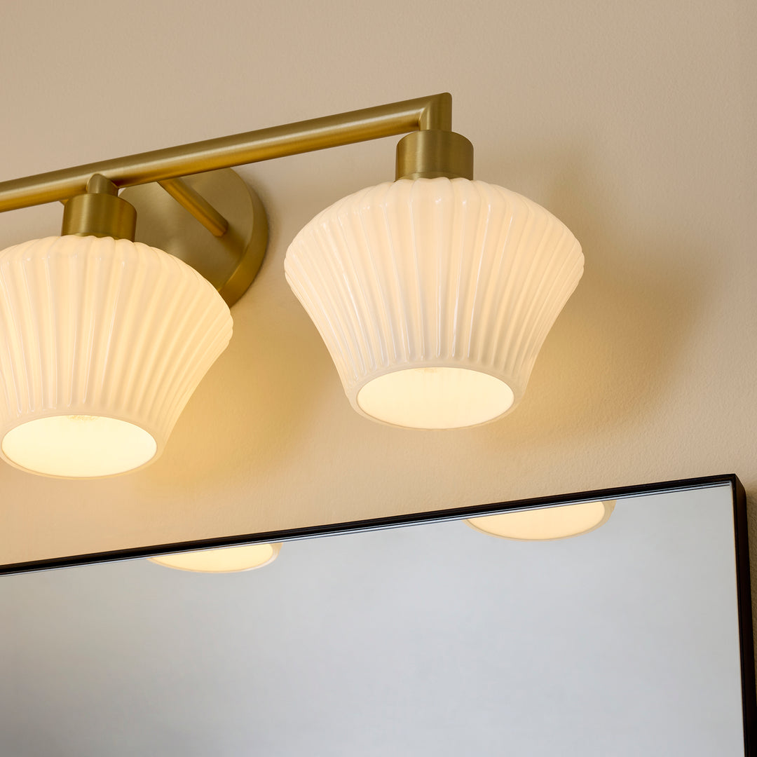 CASSINI 3 Light Vanity - Aged Brass