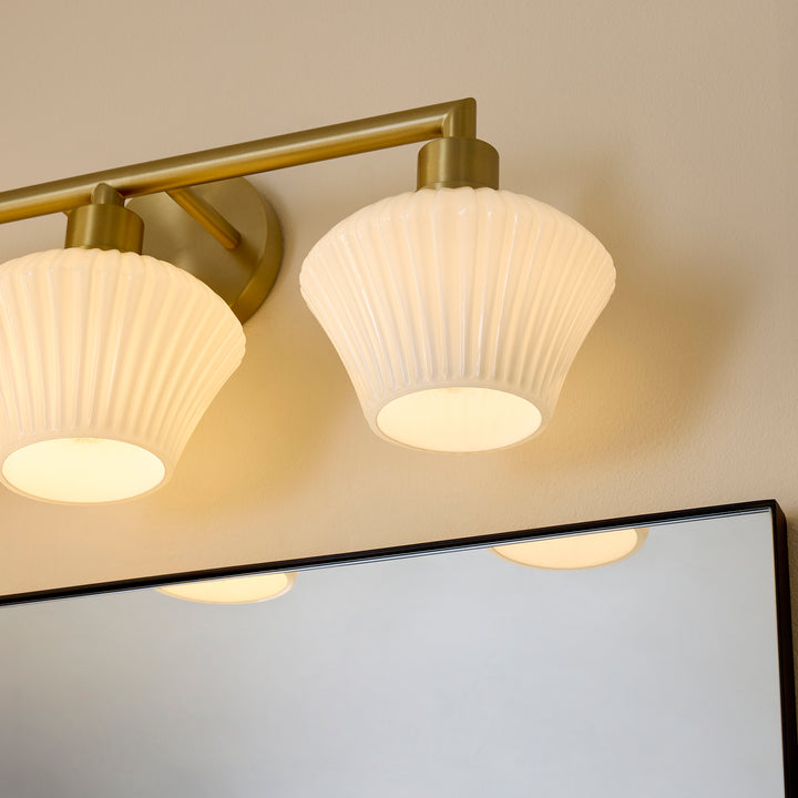 CASSINI 3 Light Vanity - Aged Brass