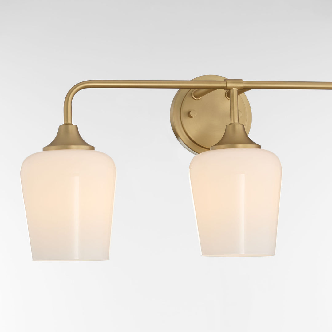 Raymond 3 Light Opal Wall Mount - Aged Brass