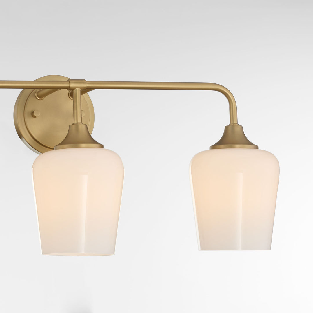 Raymond 3 Light Opal Wall Mount - Aged Brass