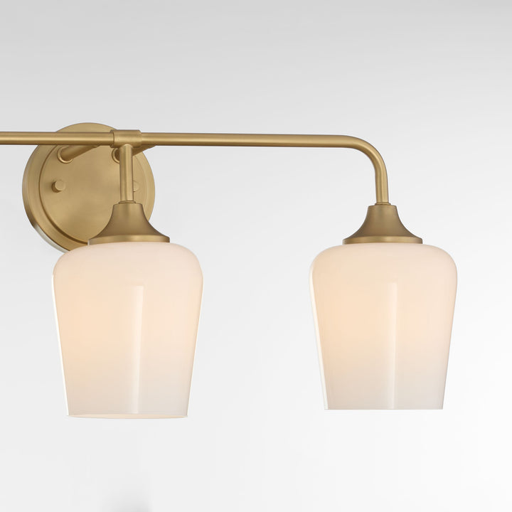 Raymond 3 Light Opal Wall Mount - Aged Brass