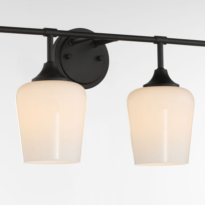 Raymond 4 Light Opal Wall Mount - Matte Black