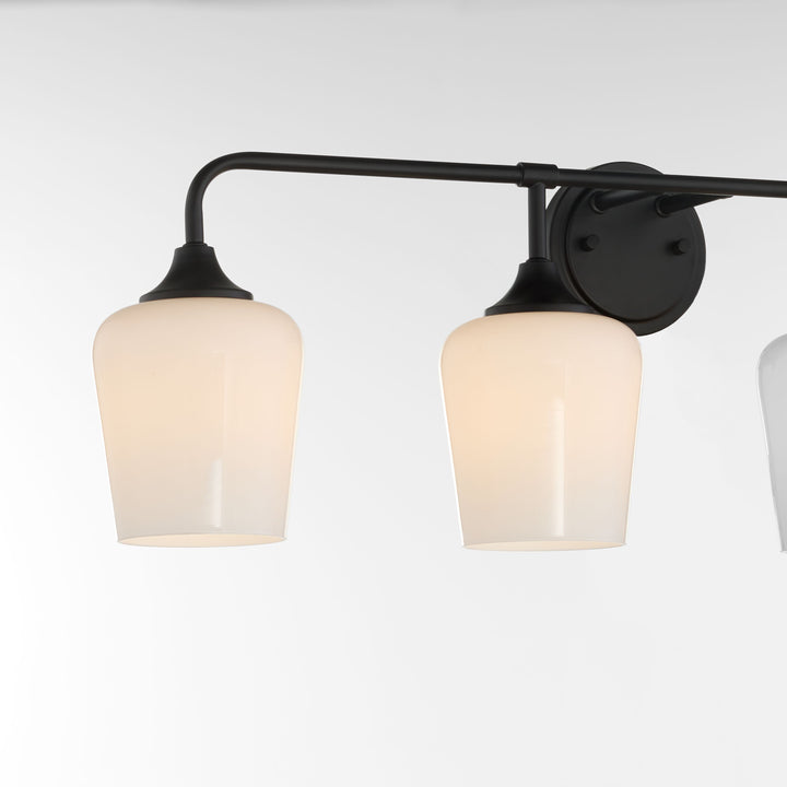 Raymond 4 Light Opal Wall Mount - Matte Black