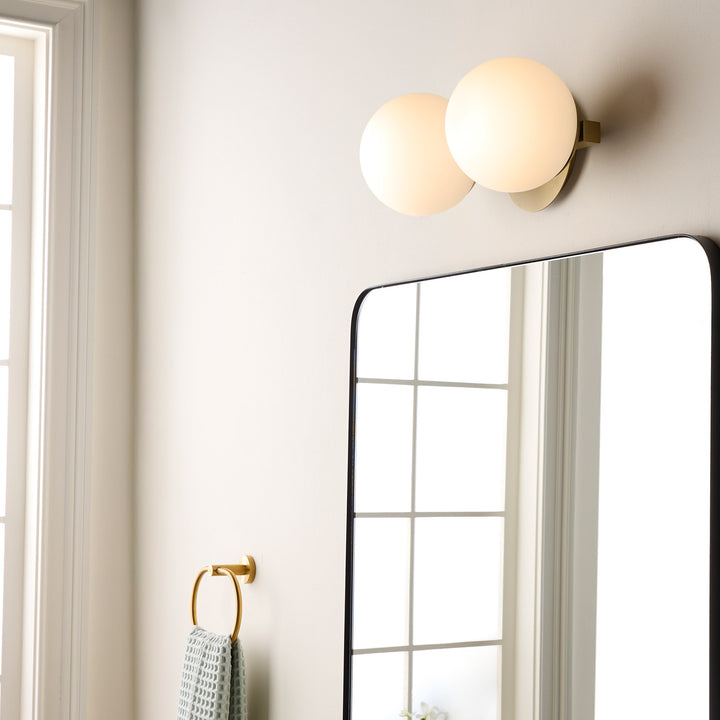 Jasper - 2 Light Modern and Contemporary Aged Brass Globe Vanity